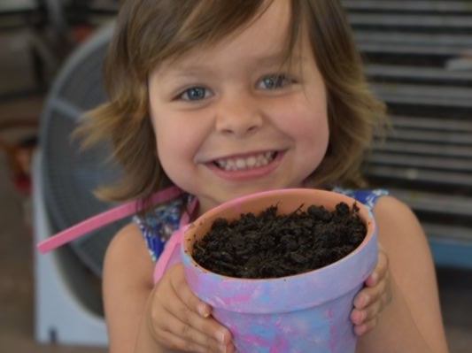 Picture of a childhood cancer hero working on art with Connors Heroes Art Sessions in Richmond VA