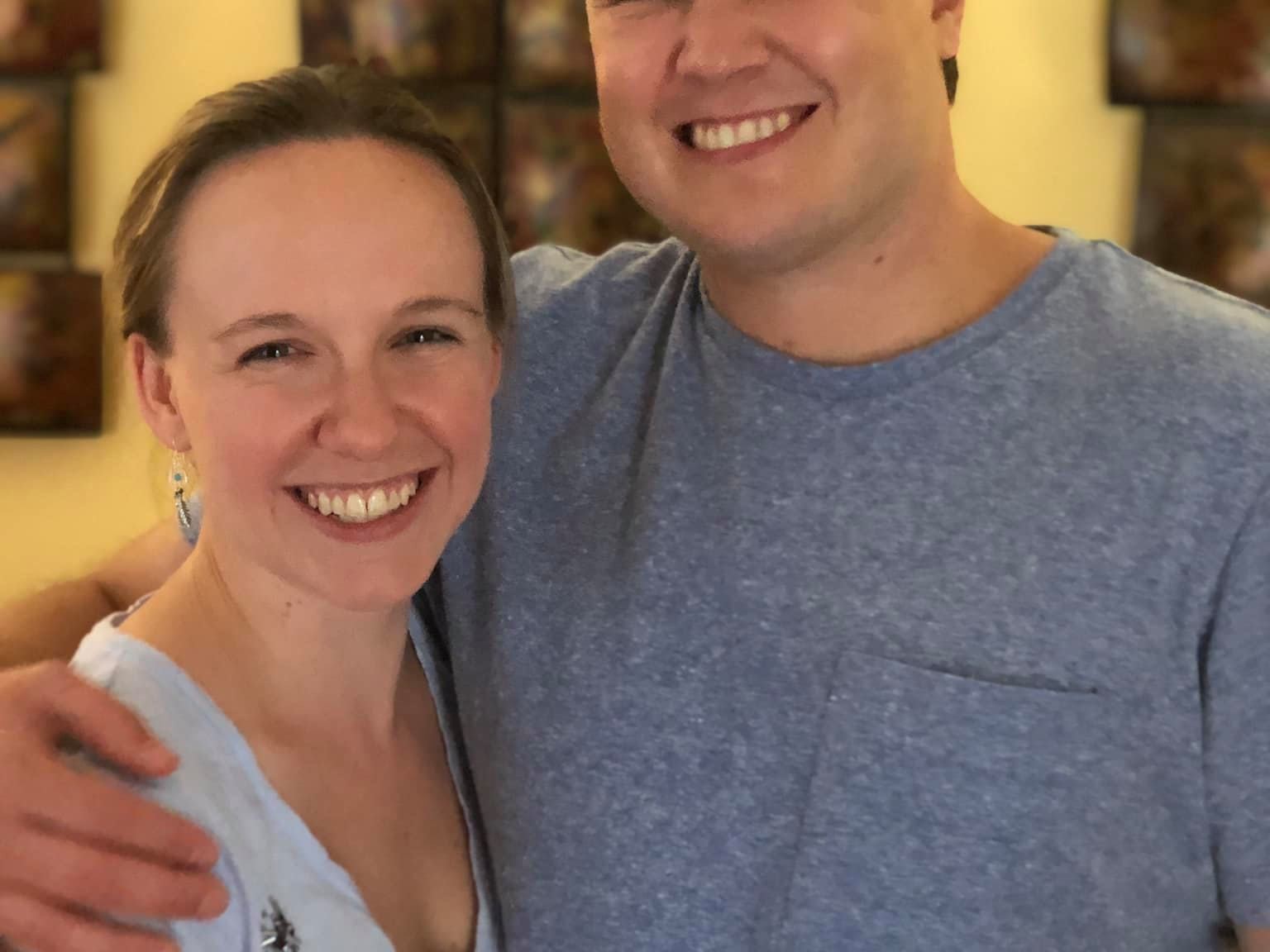 A couple smiling, Dylan is a childhood cancer survivor