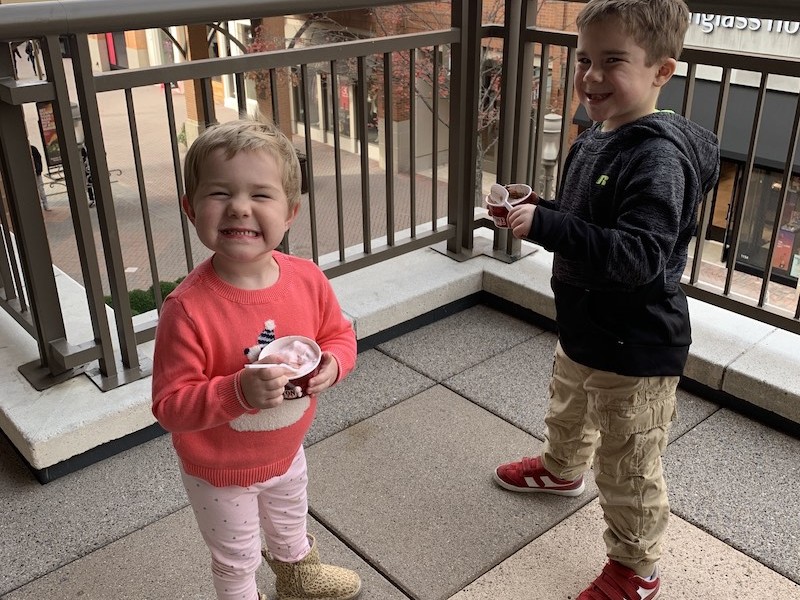 Charlie and her brother eating ice cream
