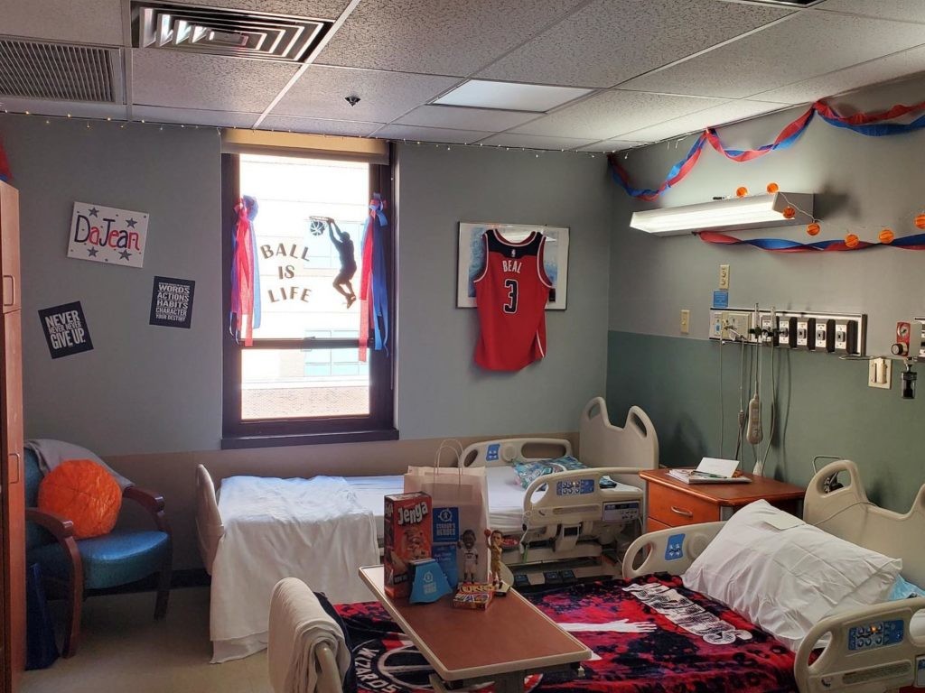 Hospital room decorated with Washington Wizard jersey and sports gear