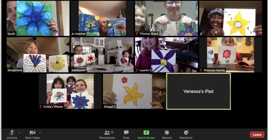 A screenshot of a video conference with 11 children
