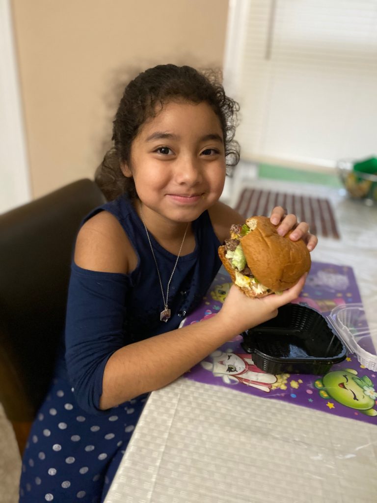 Child eating a burger