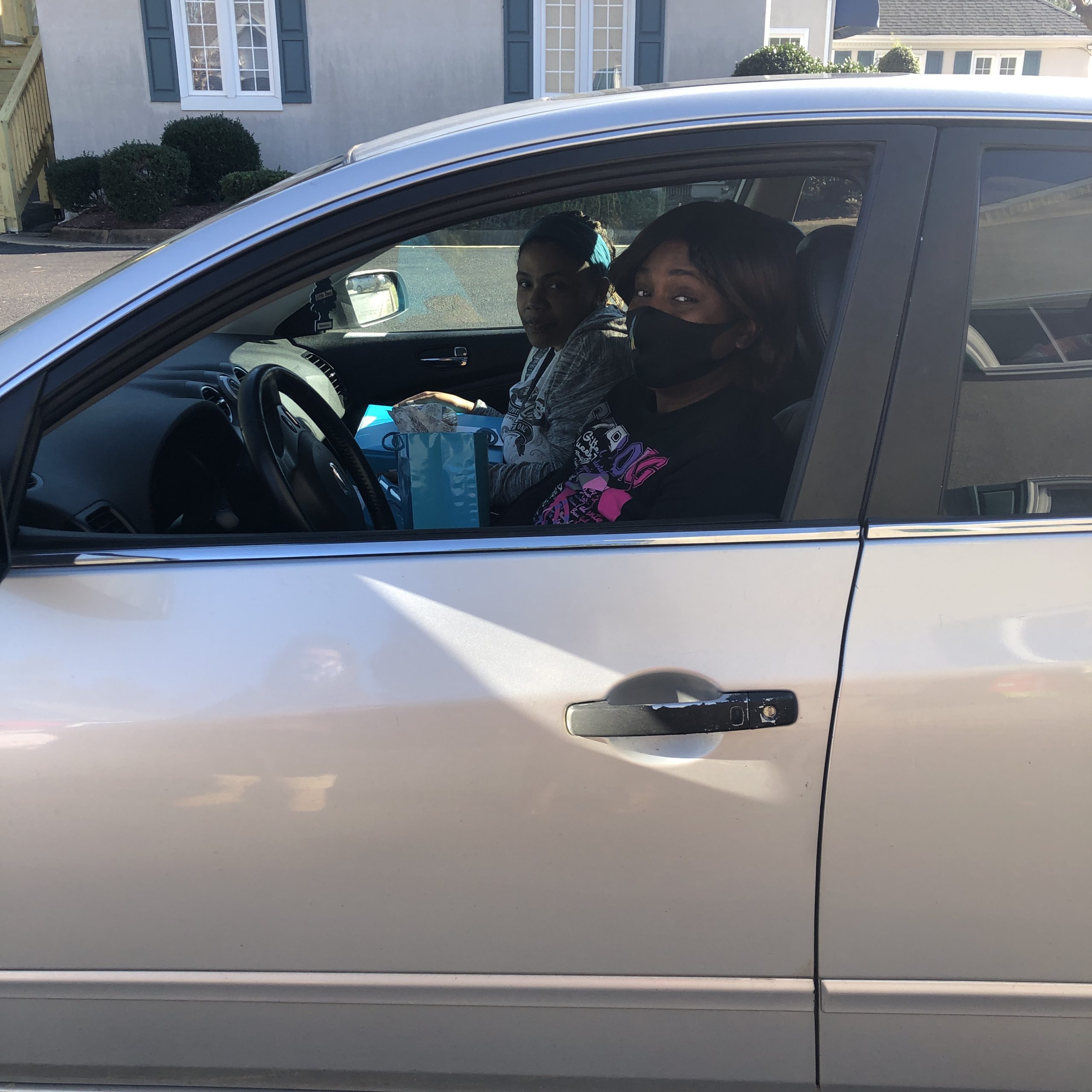 Two women sitting in a car