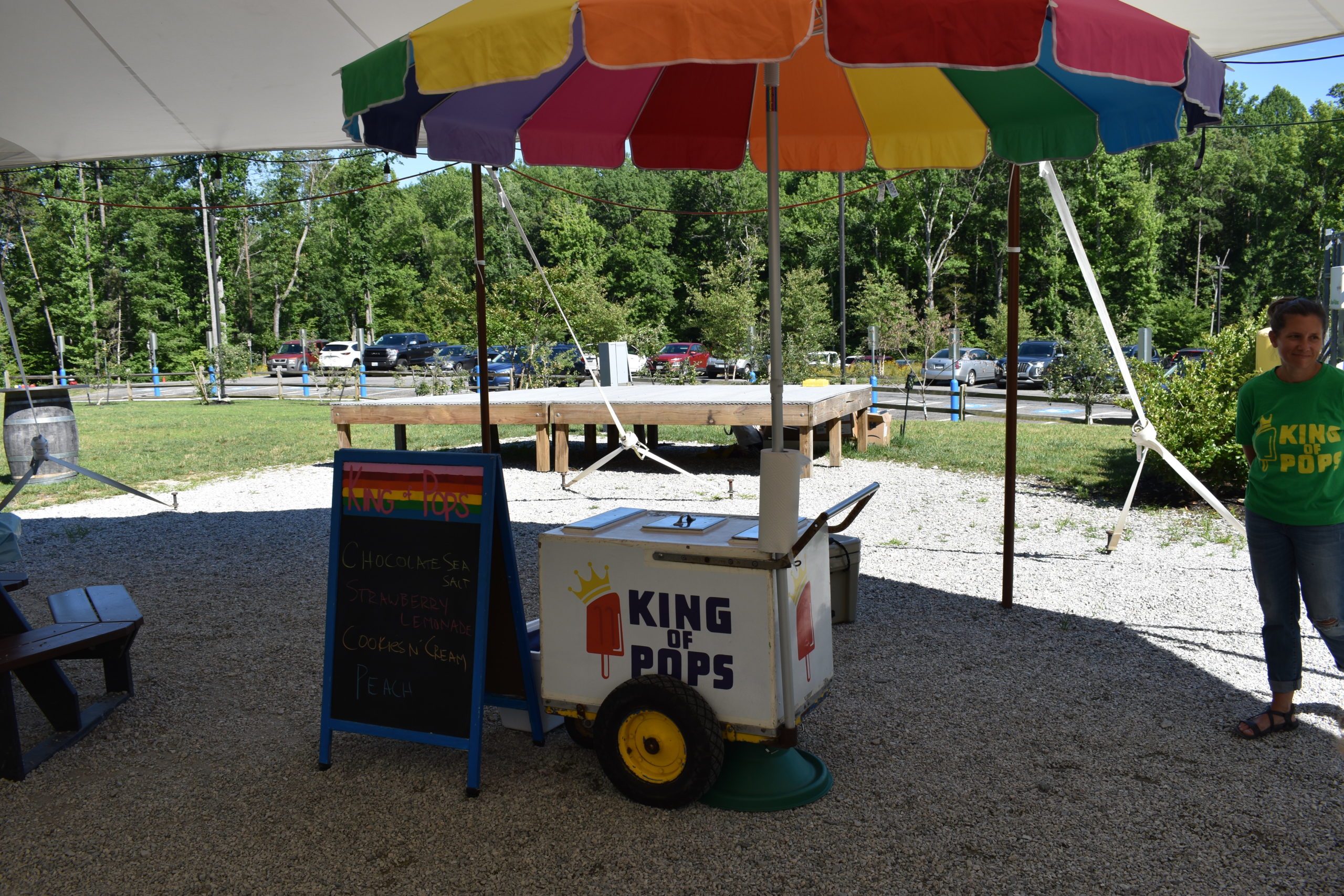 Image a small cart with wheels and text King Of Pops