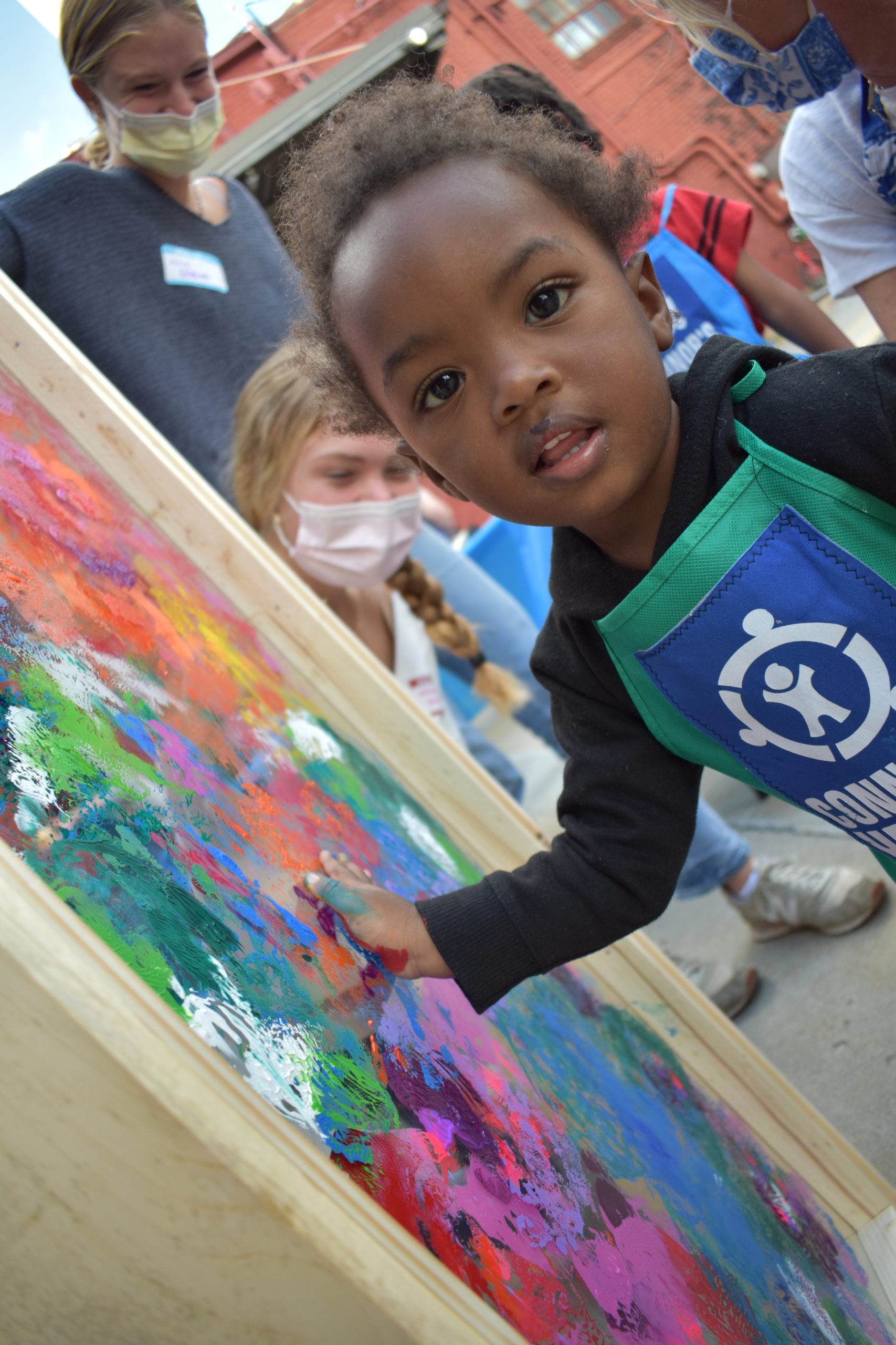 A child painting with his hands