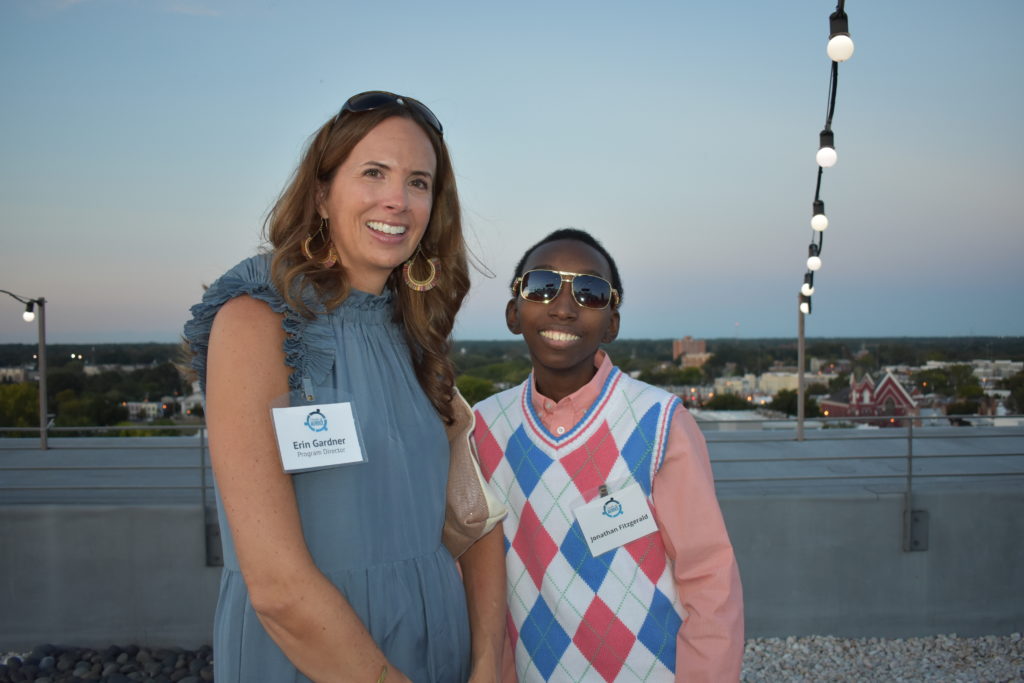 a woman standing with a teenager at a reception for Connors Heroes in Richmond Virginia