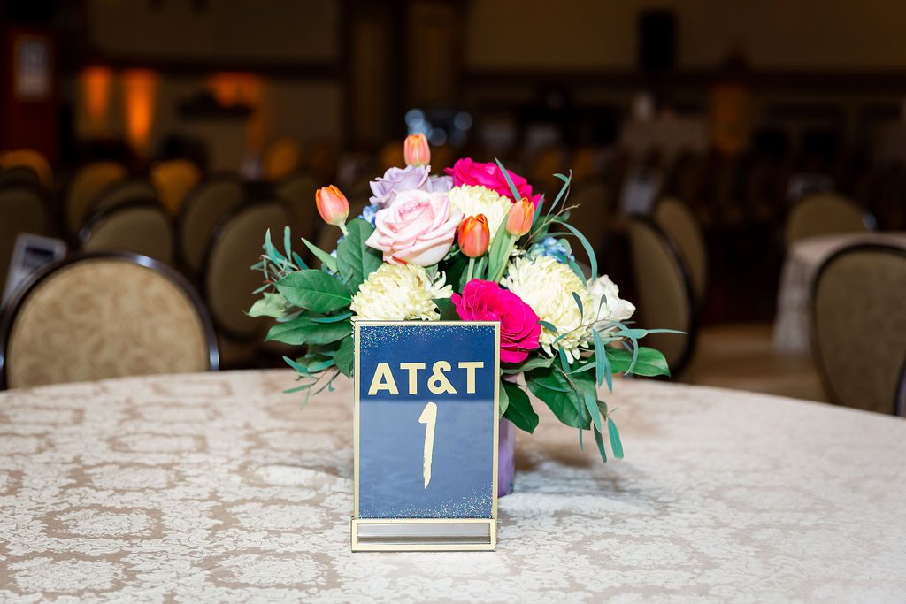 A bouquet of flowers with a sign AT&T
