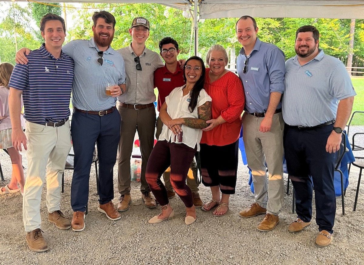 A group of people pose for a photo