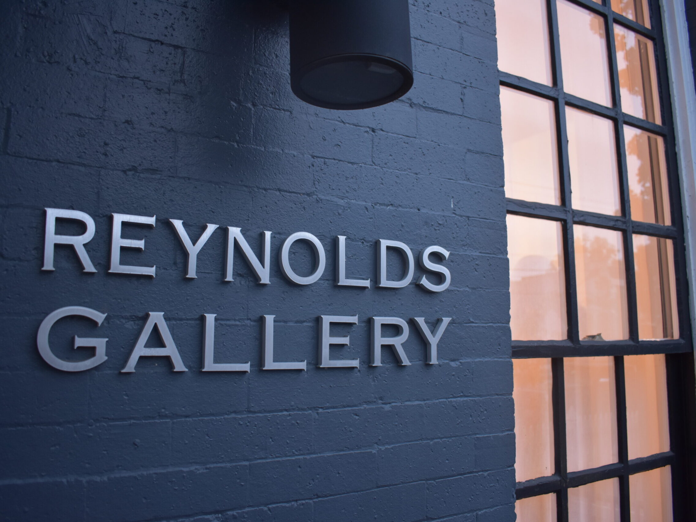 Reynolds Gallery sign from the street
