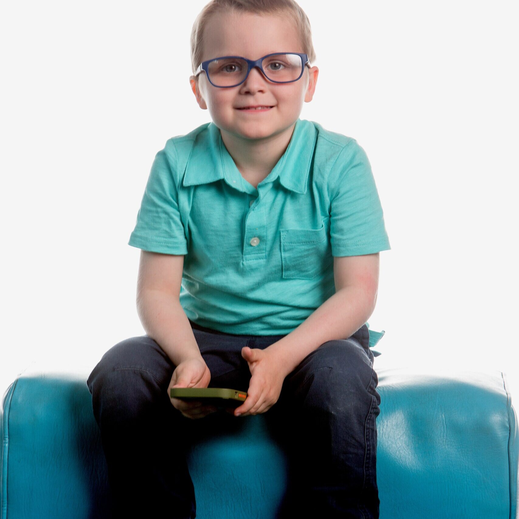 Harcum sitting on a blue couch