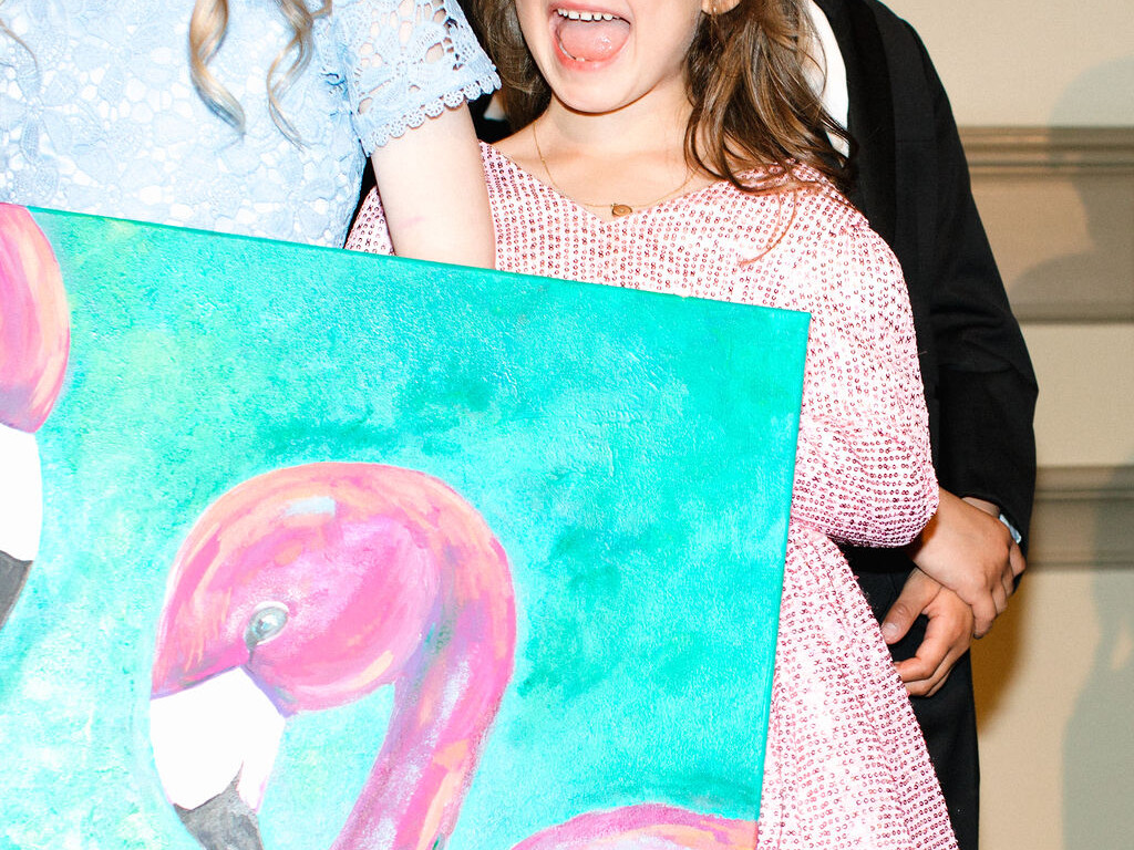 A girl is cheering at the party