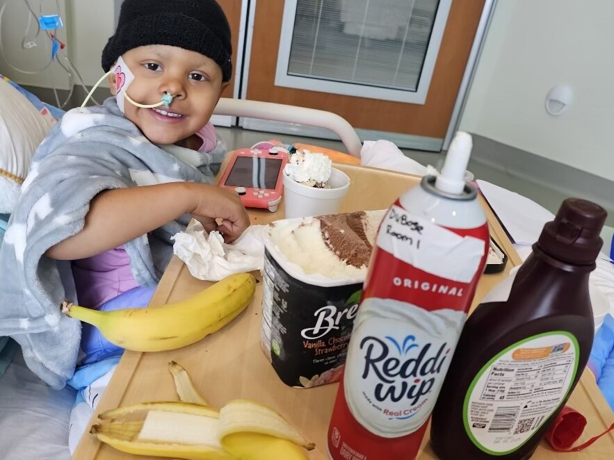 Willow is eating ice cream in the hospital