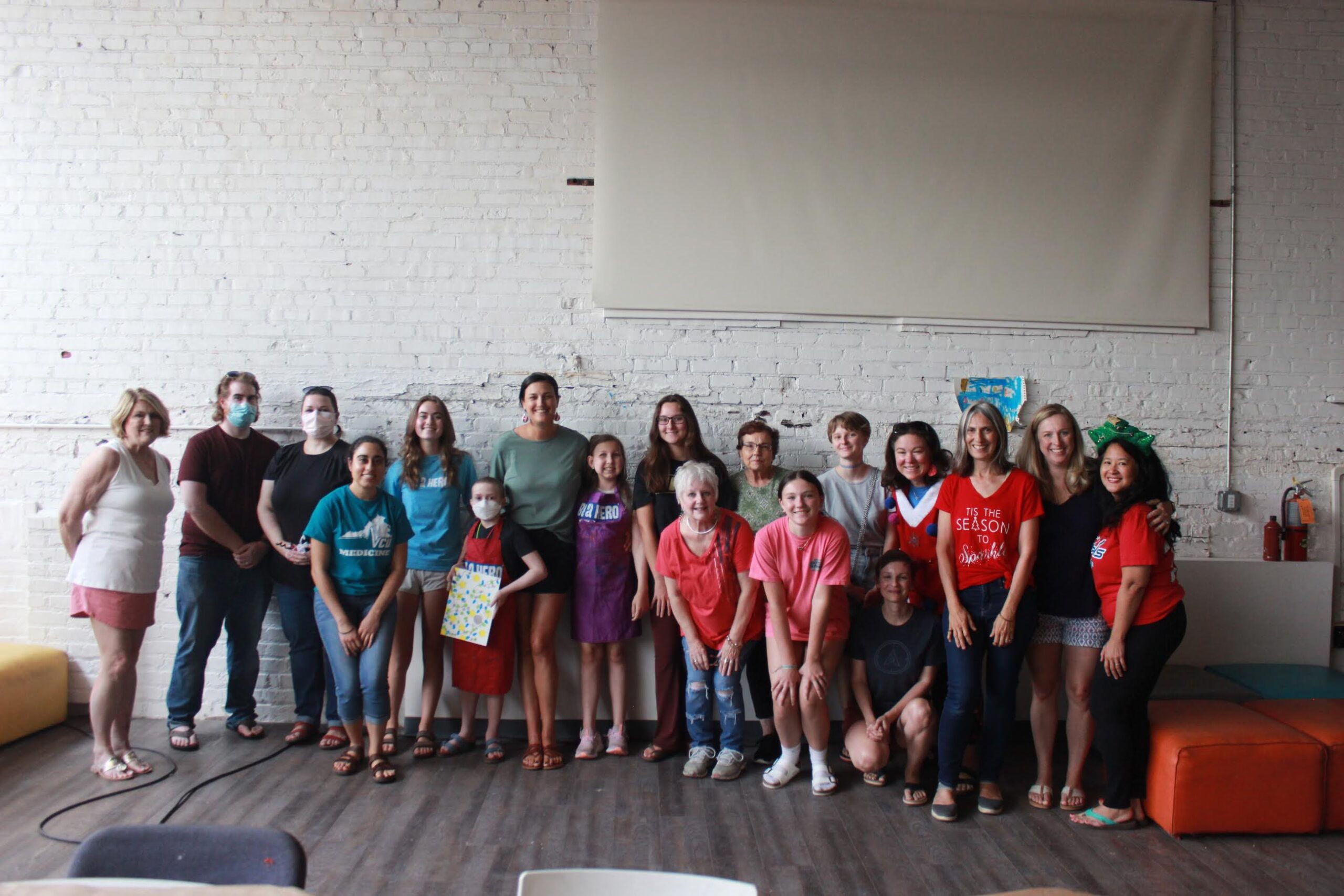 Group of volunteers with childhood cancer heroes