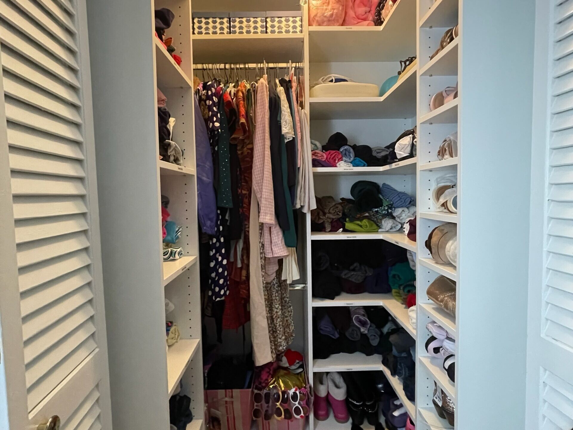 A closet organized with shelves