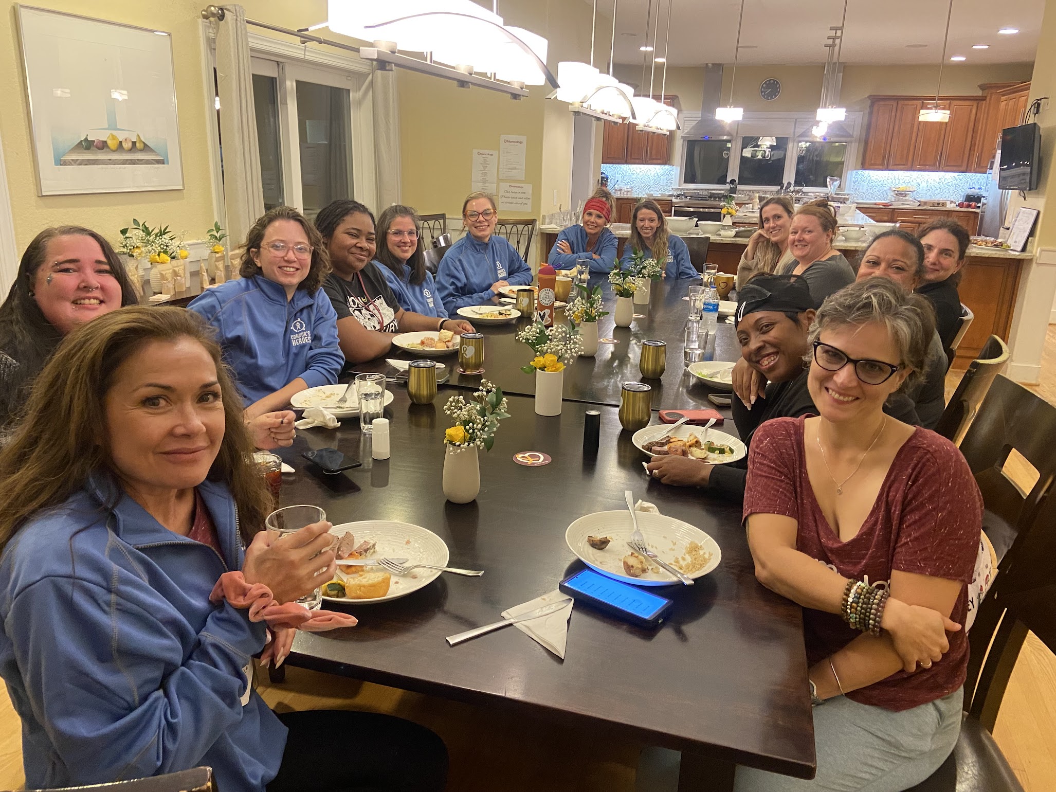 A group of women eating dinner together