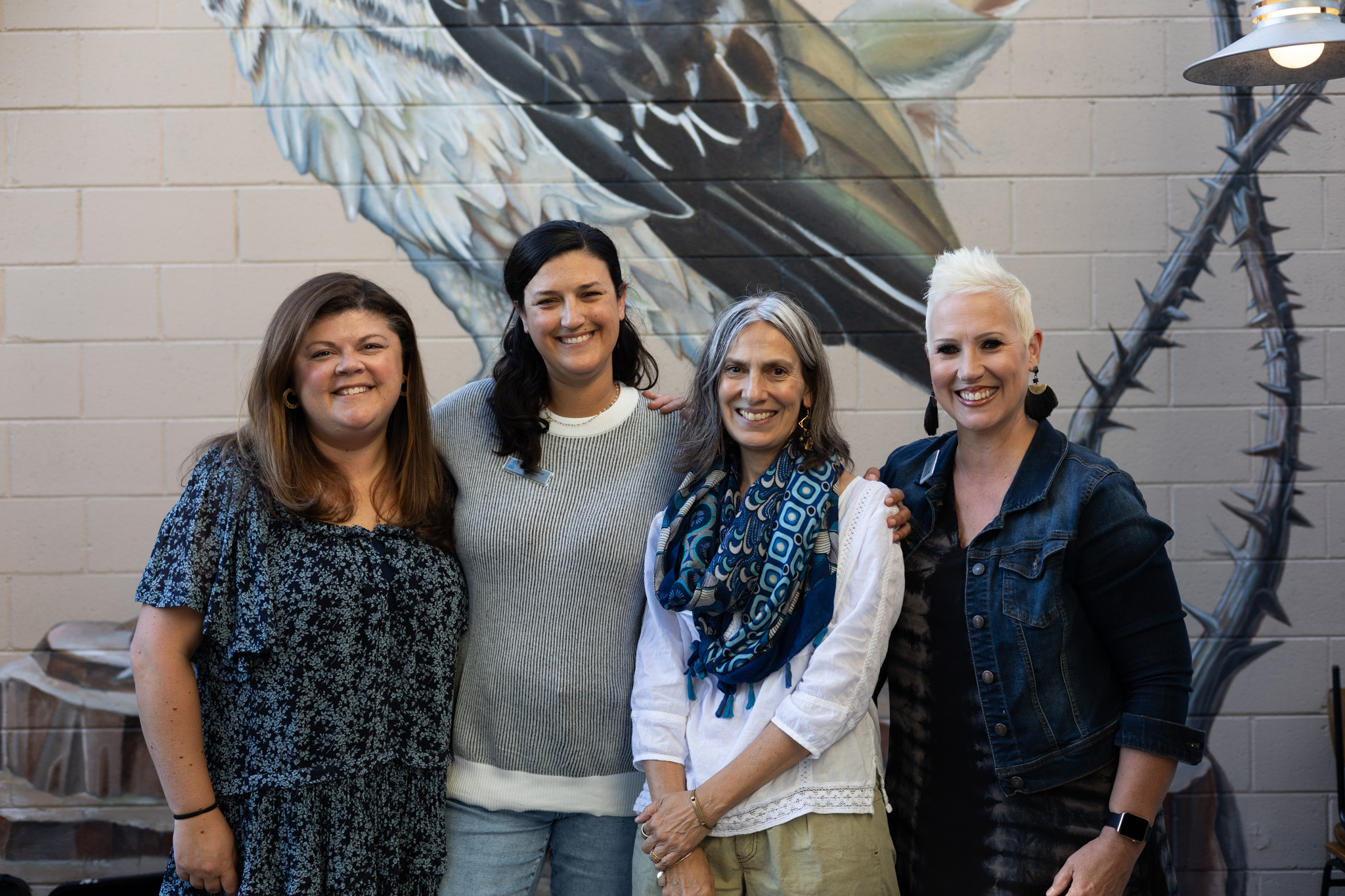 Four staff members of Connor's Heroes