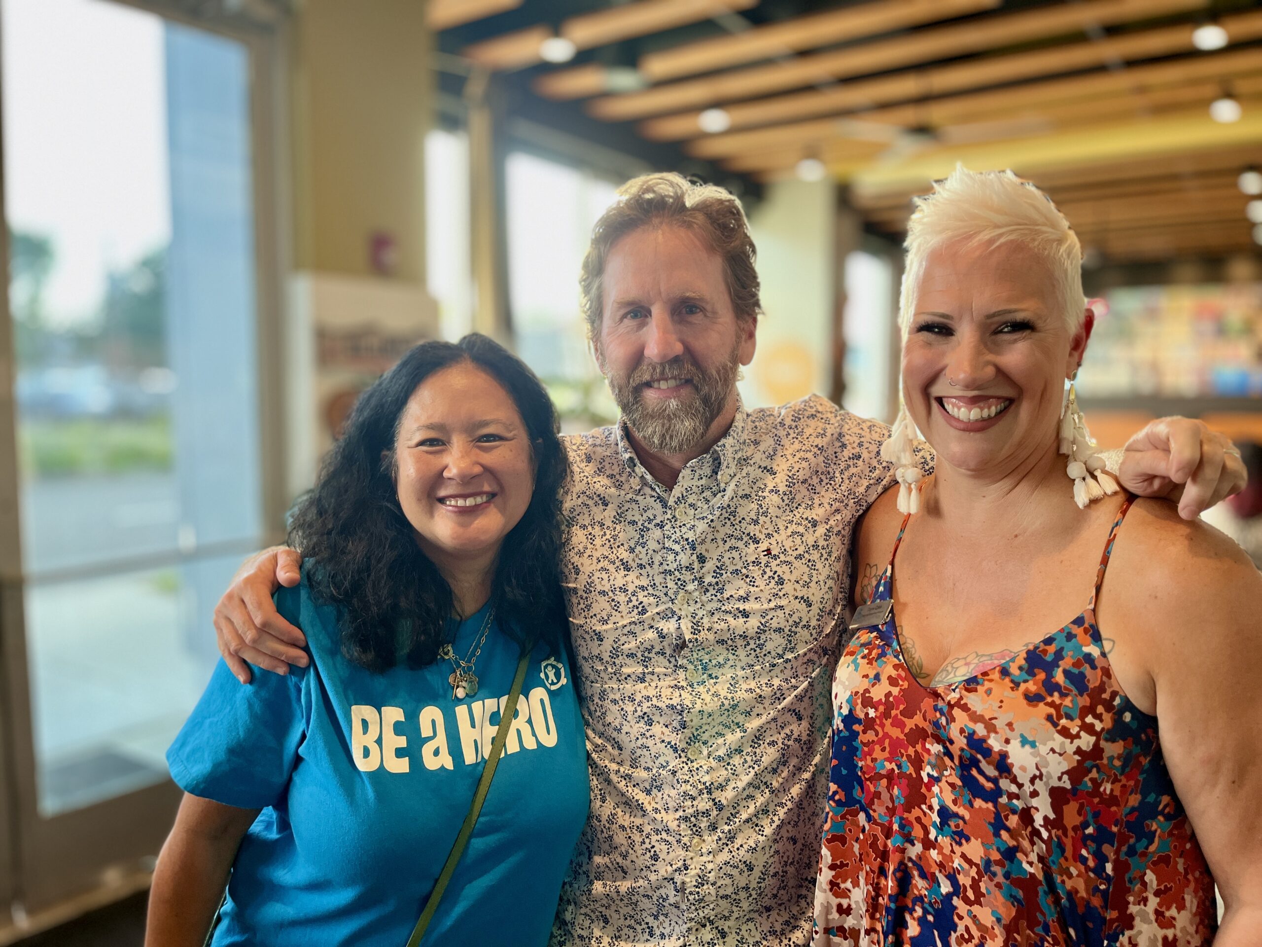 Three people standing together