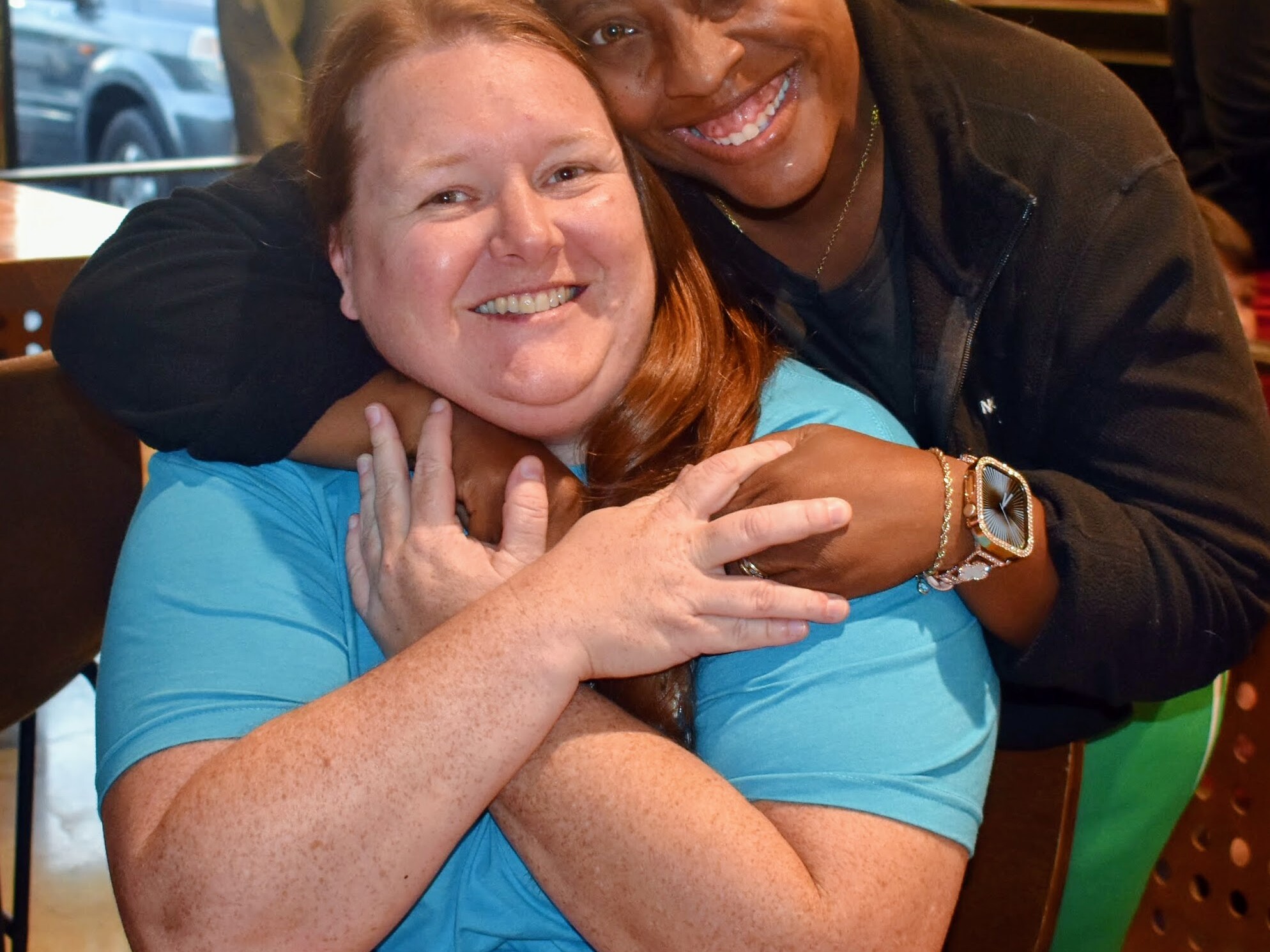 two women hugging