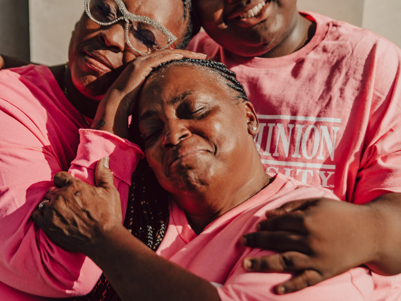 a family hugging one another